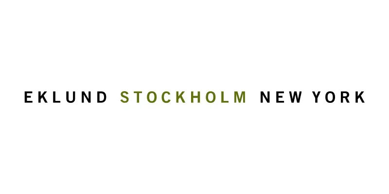 Mäklarbyrån Eklund Stockholm New Yorks logotyp.