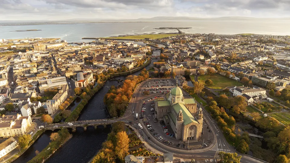 Aerial view of Galway city with the cathedral, River Corrib and Galway Bay in the background