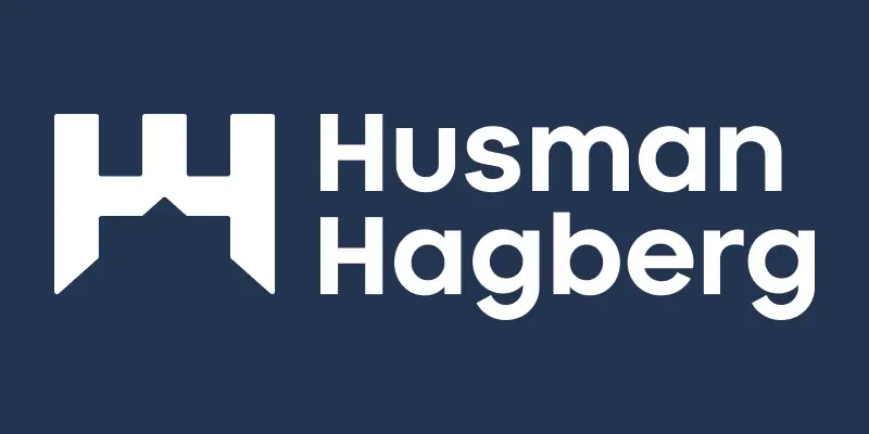 Mäklarkedjan HusmanHagbergs logotyp.