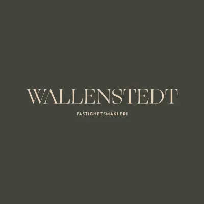 Mäklarbyrån Wallenstedt Fastighetsmäkleris logotyp.